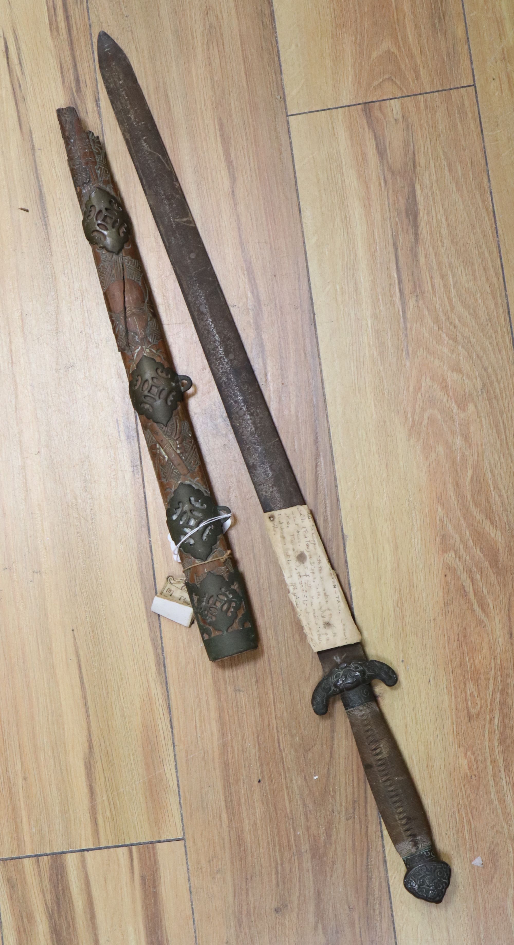 A Chinese double edge sword, Jian, late Qing, corroded